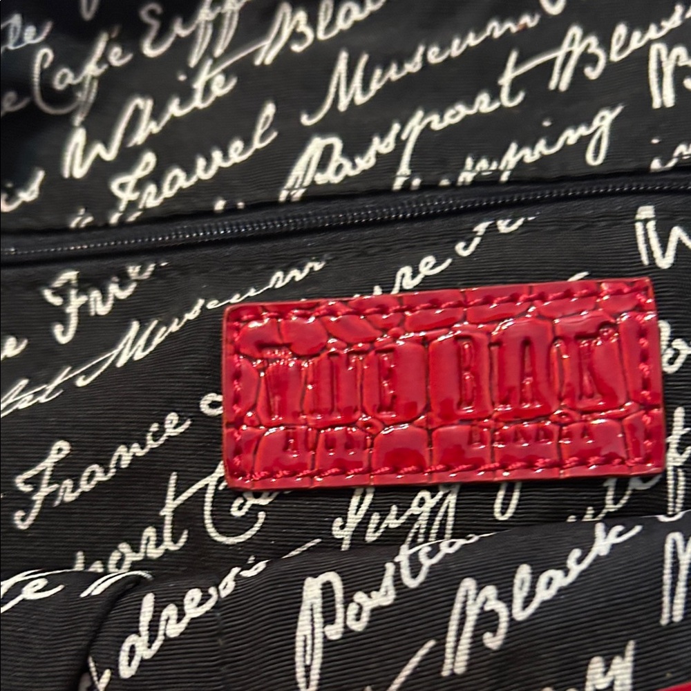 Red Embossed Bag with Script Design